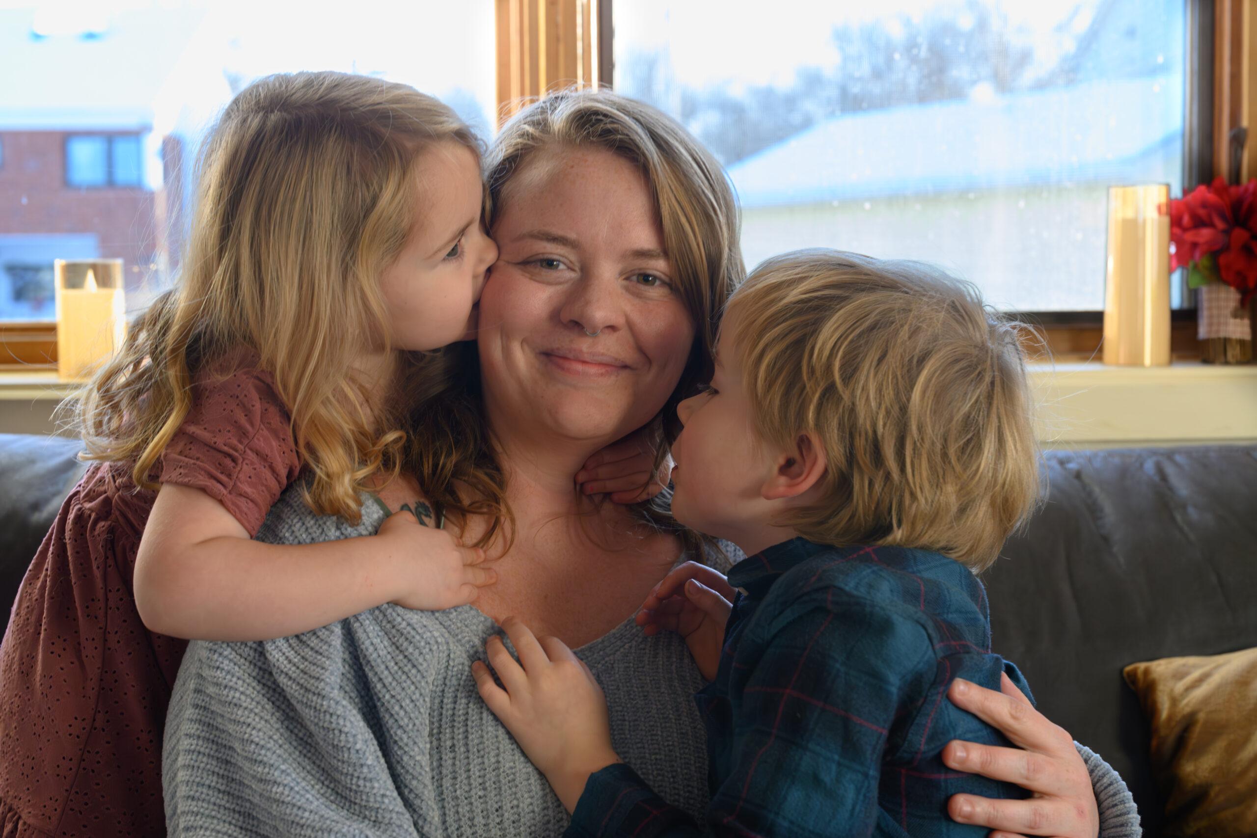 Nontraditional student, Liz with her two children.